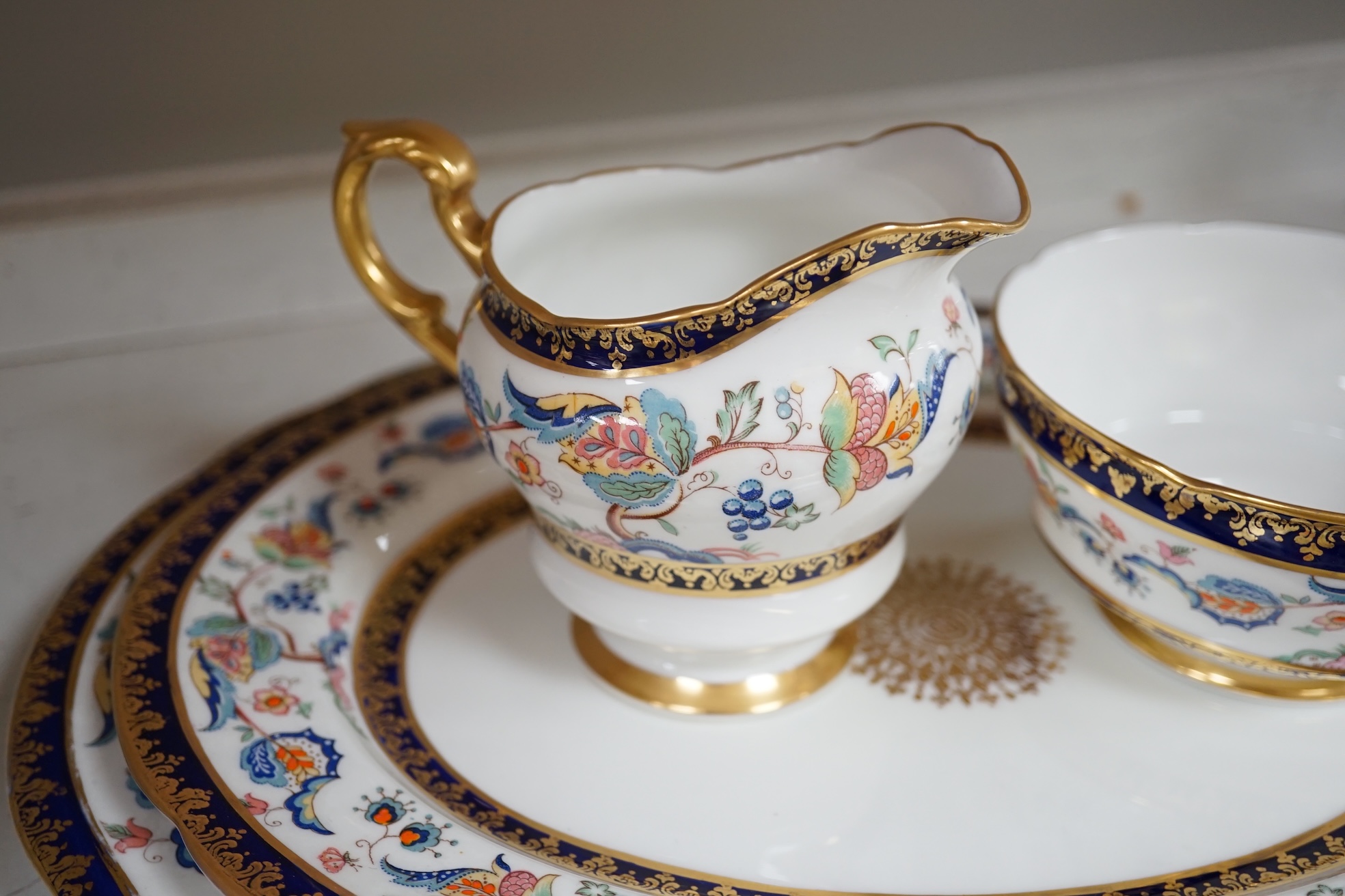 An extensive Paragon bone china dinner service to include tureens, plates and sauce boats. Condition - fair to good